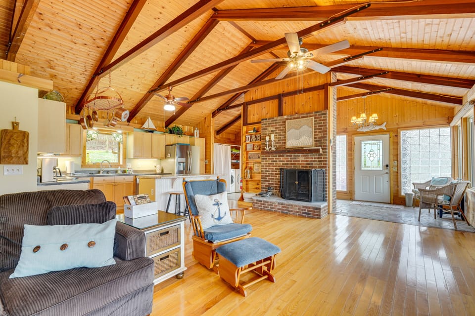 Living Room | Single-Story Cabin | Open Floor Plan | Wood-Burning Fireplace