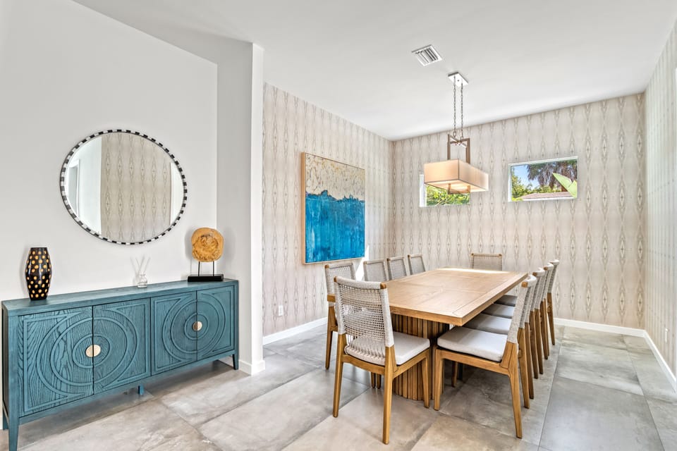 An intimate dining setting that effortlessly blends comfort and style, ideal for both casual meals and special occasions.