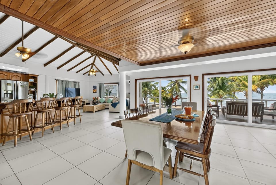 View of gorgeous kitchen and dining table.