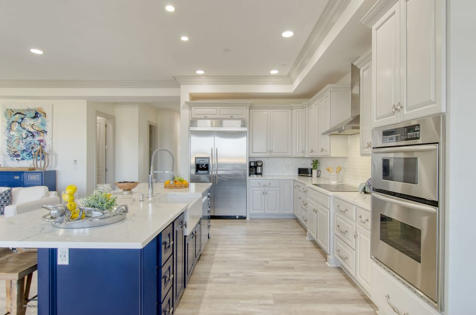 Fully equipped, gourmet chef's kitchen has everything you need for storage, prep, and serving.