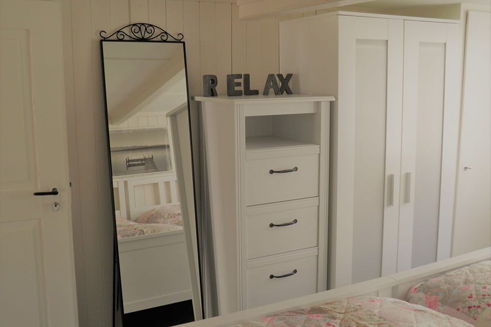 There is a wardrobe in the bedroom