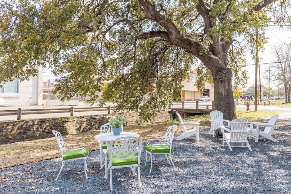 Shared outdoor seating area with wood-burning fire pit. 