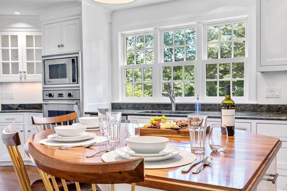 A dining space that blends comfort, style, and stunning views.