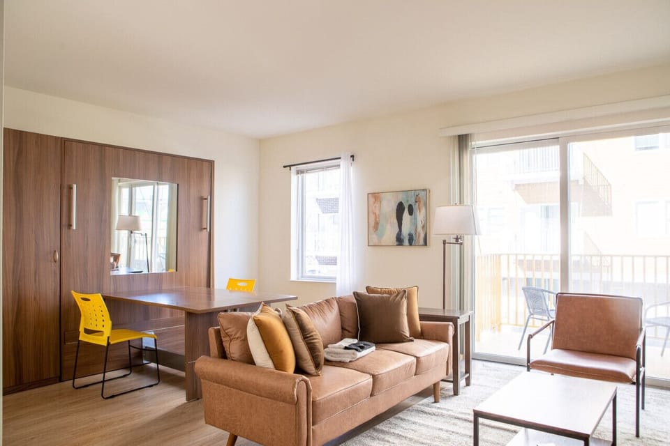Smartly designed Murphy bed transforms the space in seconds—enjoy a comfortable night’s sleep without sacrificing daytime living space