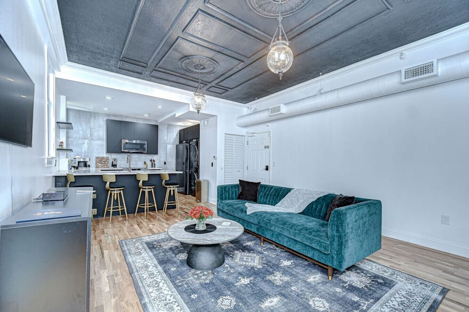 Rockstar vibes at Rockin` Johnny! There is also comfortable seating for 4 in every room. There is also a 50` smart tv (not pictured) in the living room.