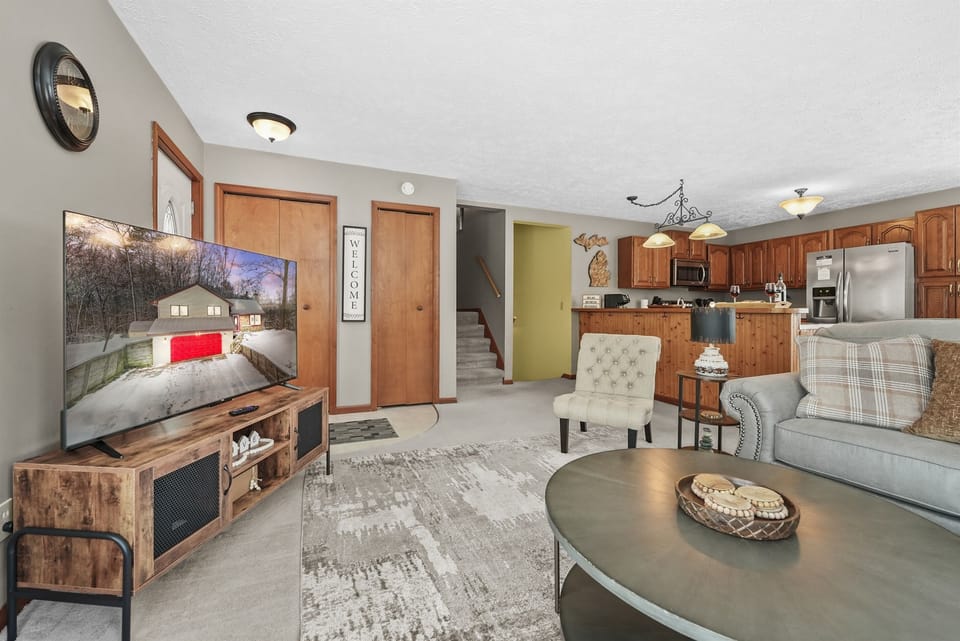 Living Room: Unwind in style with ample seating and a sleek TV for movie nights!