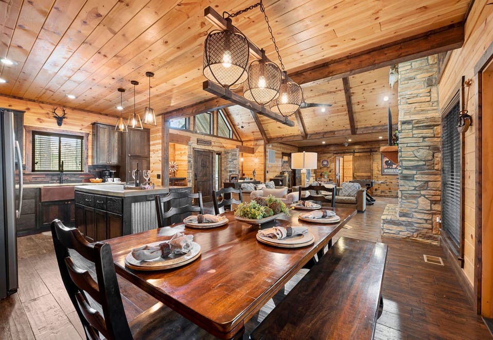 Cozy up in our rustic dining space, where every meal feels like a family gathering in the heart of the woods