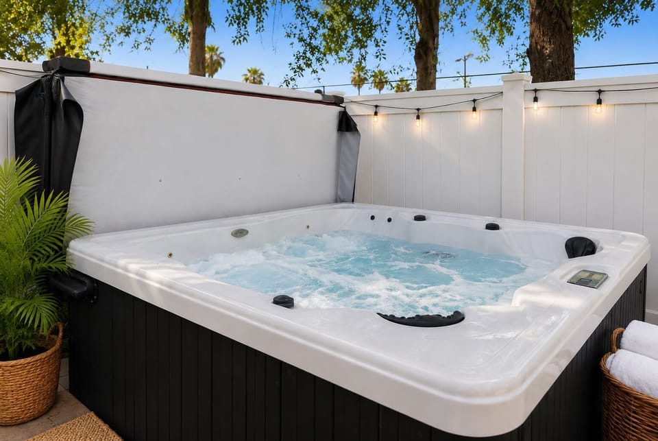 Relax, recharge, and soak under the stars in your private hot tub—the perfect way to end a day at the beach. One of the reasons families love our home! #BestFamilyAirbnb #BradentonAirbnb #FloridaVacation #FamilyGetawayBradenton #HotTubAirbnb