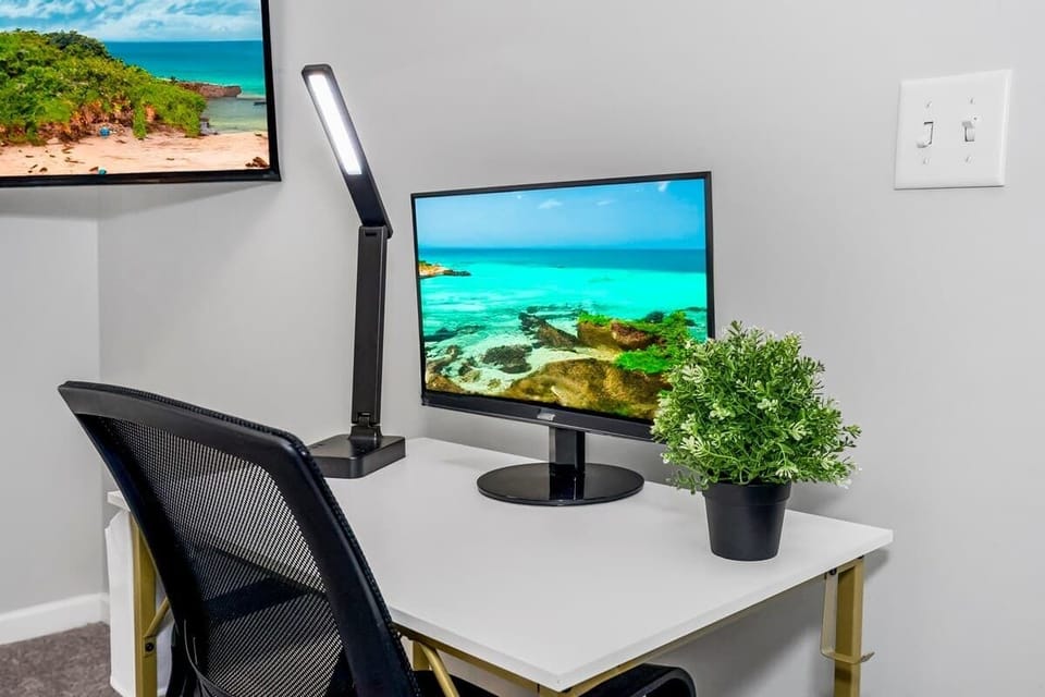 Work desk with chair, and monitor