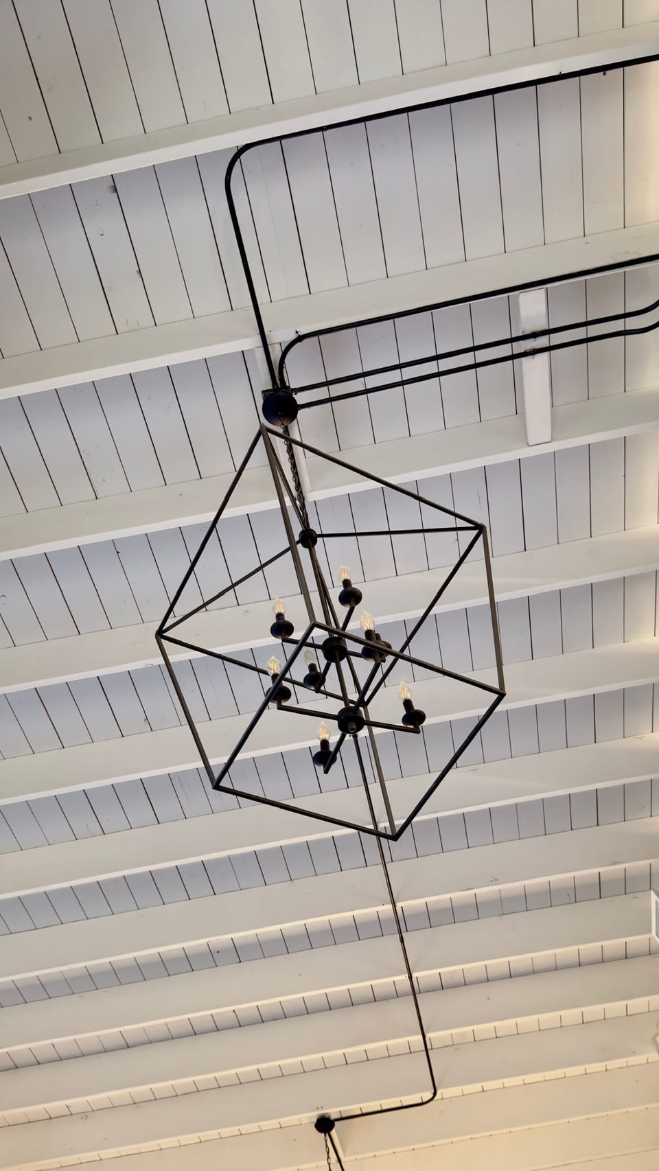 Exposed beam ceiling with unique lighting