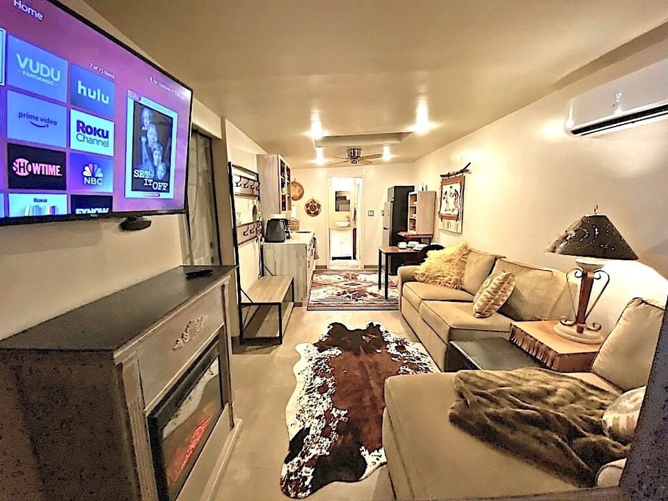 Roky TV, Firplace and Sofa area