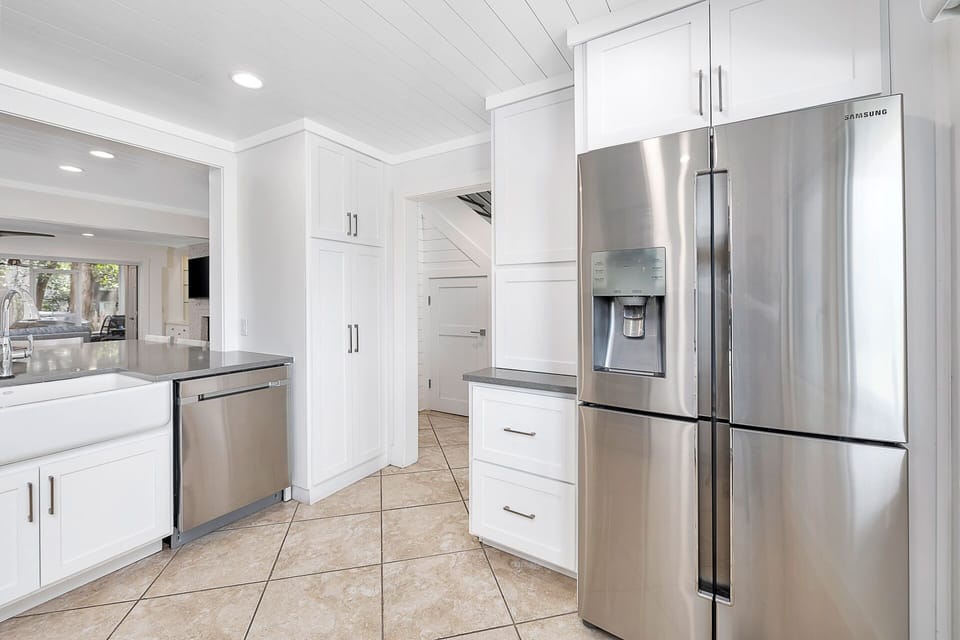 Top of the line appliances, well stocked kitchen allows for cooking in. 