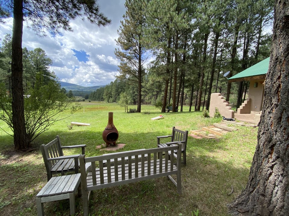 Meadow and mountain views from our backyard seating area and fire pit