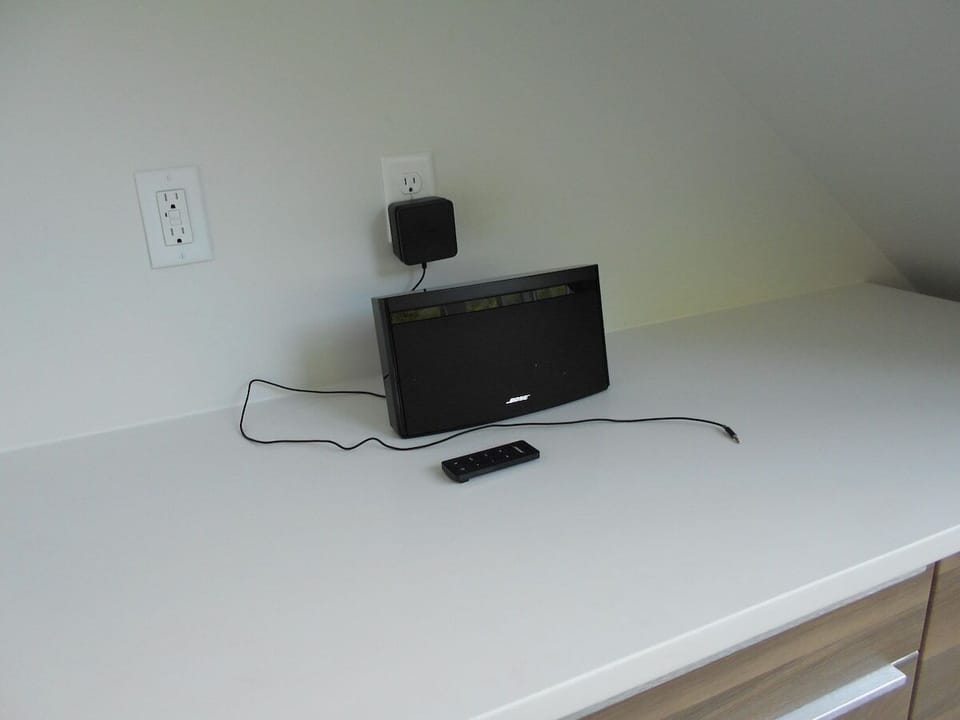 The BOSE stereo system for you to plug your device into.