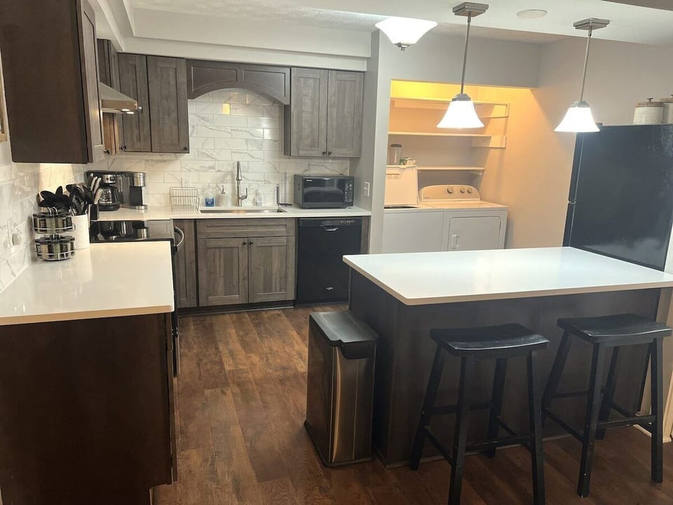 spacious, remodeled kitchen and laundry area 