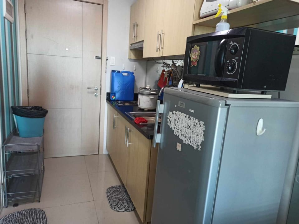 fridge and kitchen and micro wave