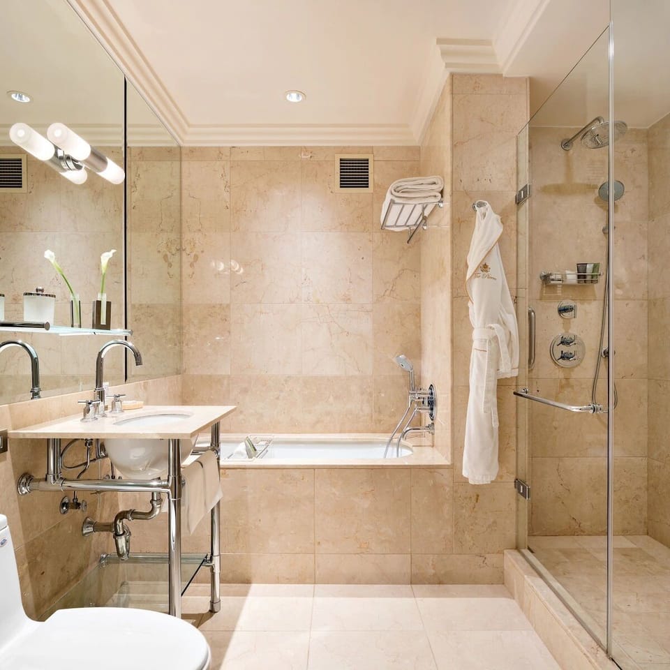 Soak or shower in a spa-like bath with glass enclosure.