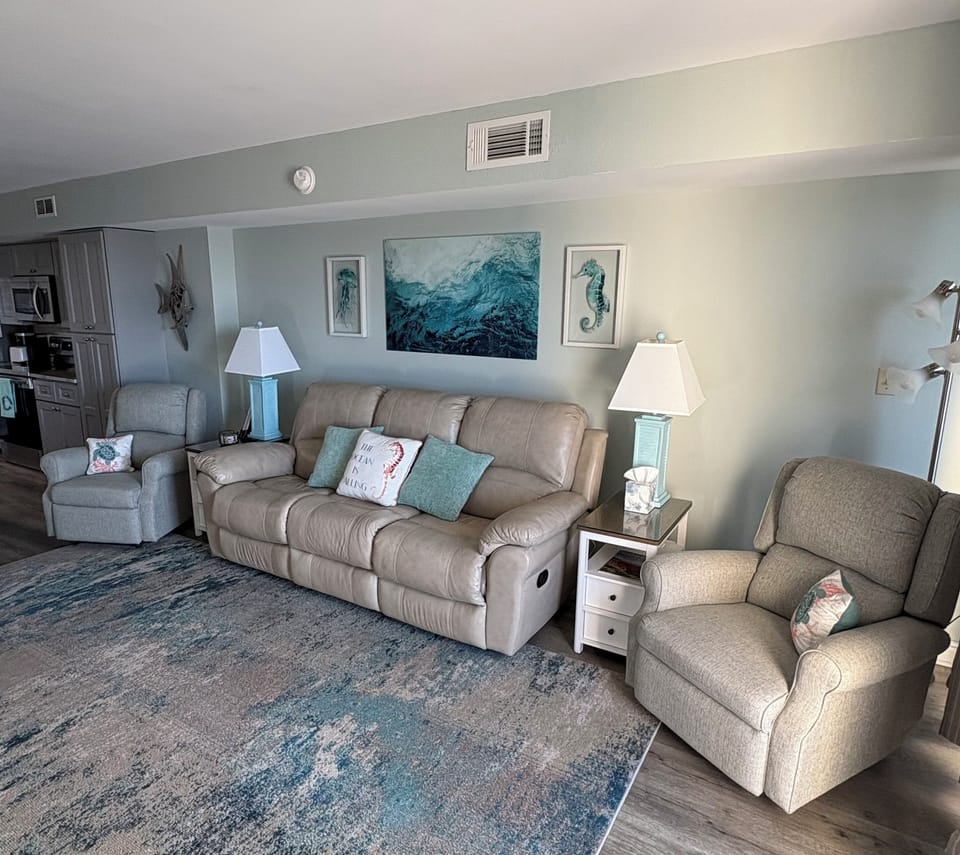 Two matching recliners plus leather reclining sofa 