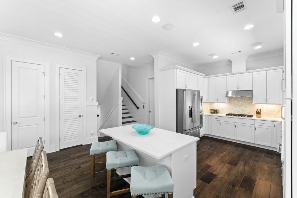 The spacious kitchen makes gatherings comfortable for the whole group.