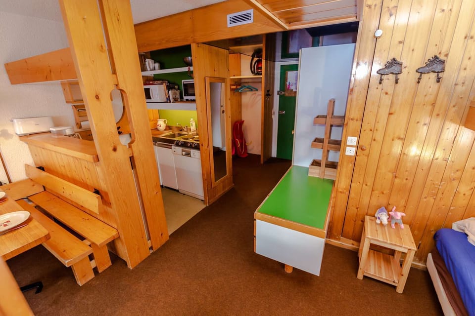 A convivial kitchen opening onto the living room