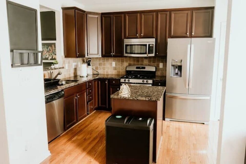 Kitchen equipped with cooking essentials and welcome coffee bar