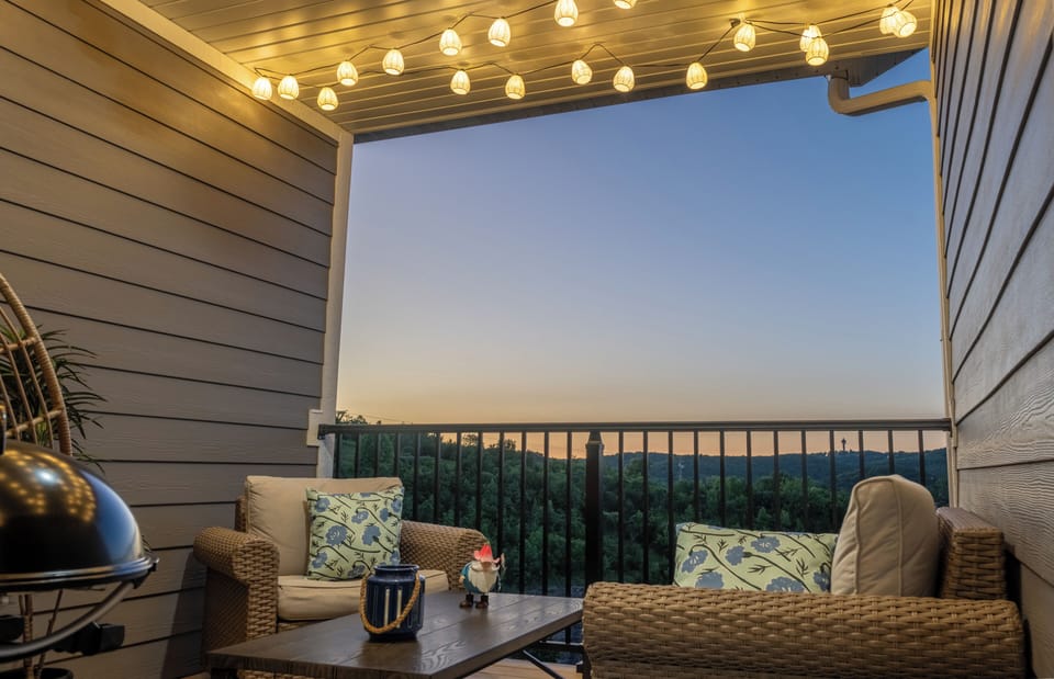 Cozy evening on the balcony with string lights and amazing view!