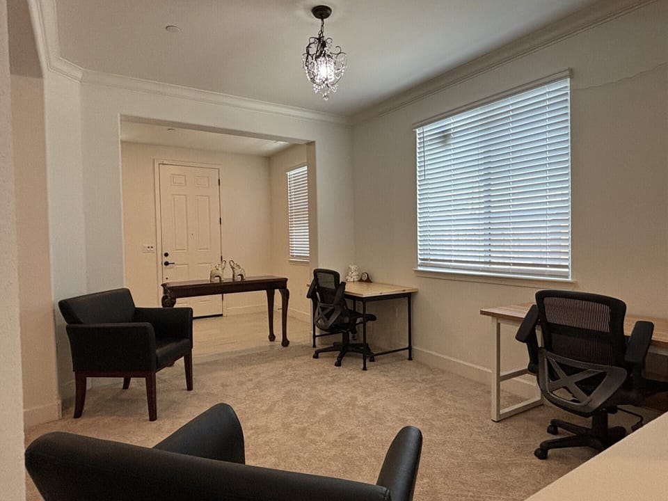 Flex room downstairs set up as your home office, working area or business office