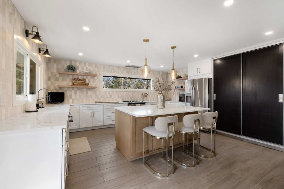 Open concept kitchen so you can connect with guests in living space