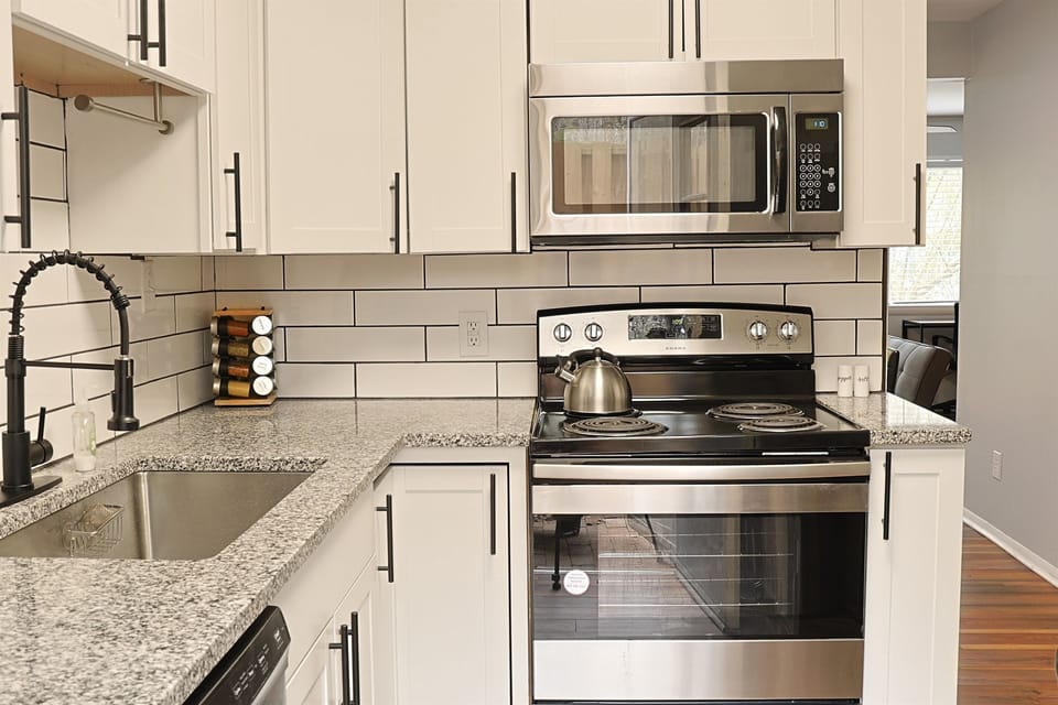Kitchen-fully equipped and newly updated with granite countertops and stainless steel appliances