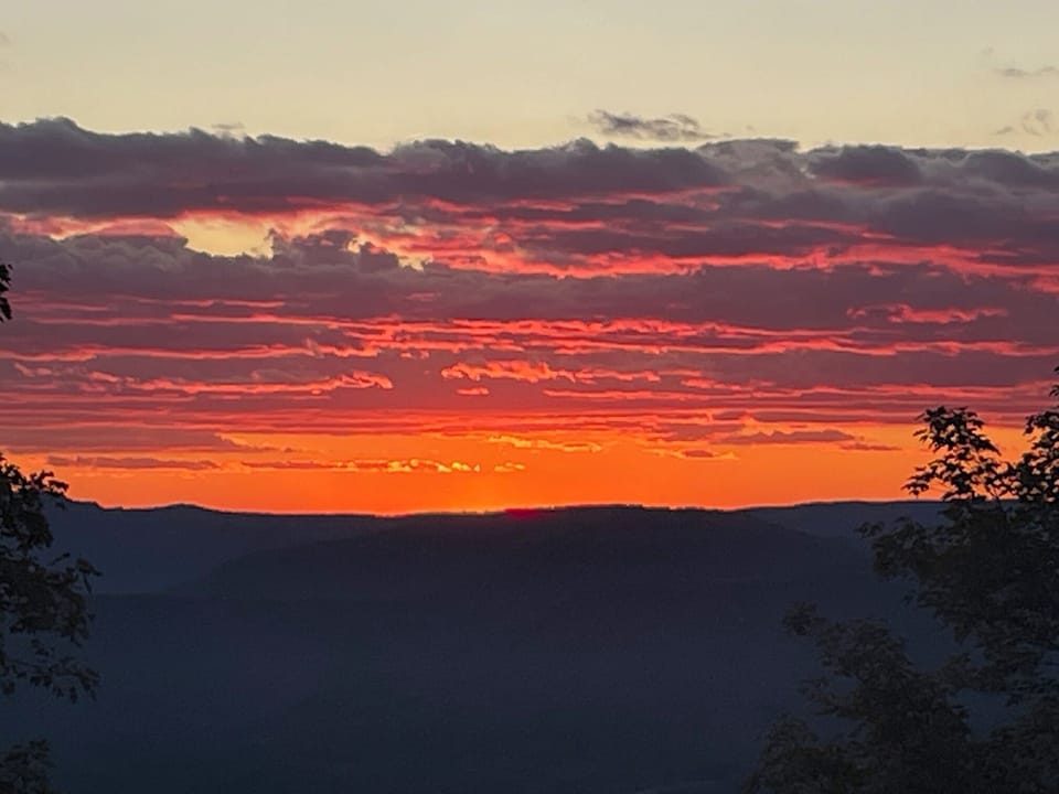 Enjoy beautiful sunsets from inside or outside