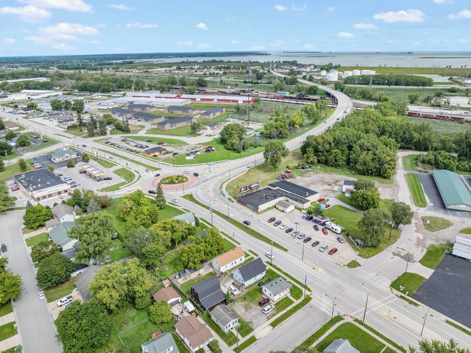 Drone shot showing how close the tiny house is to the Hwy43 to take you anywhere