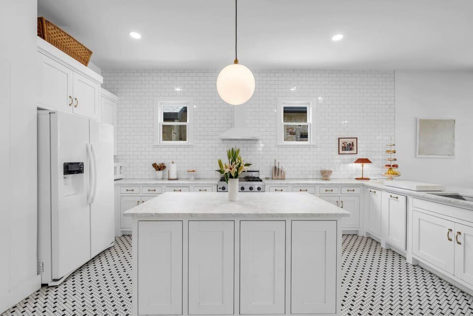 This elegant kitchen is fully stocked for all your culinary needs!