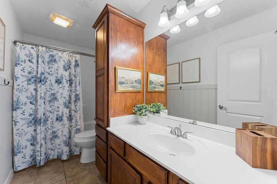 Bathroom two has lots of countertop space and a tub/shower combo!