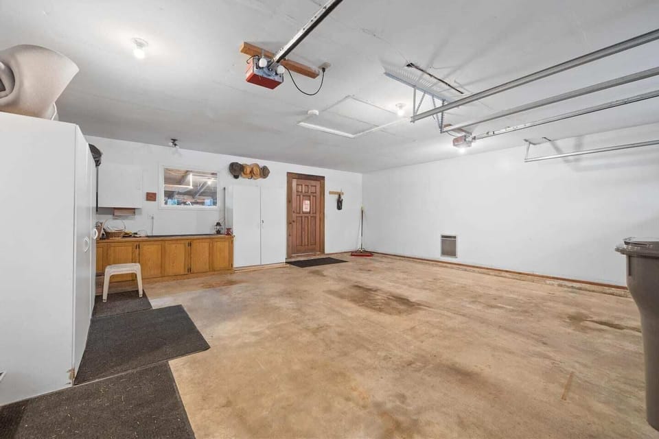 Garage: 2 vehicles plus parking on driveway