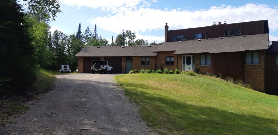Long driveway can accommodate trailers/ATV'S/snowmobiles.