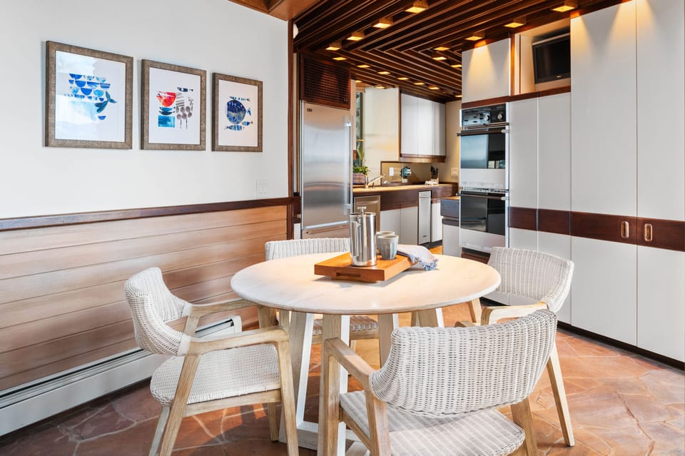 Dining table right off the kitchen seats 4