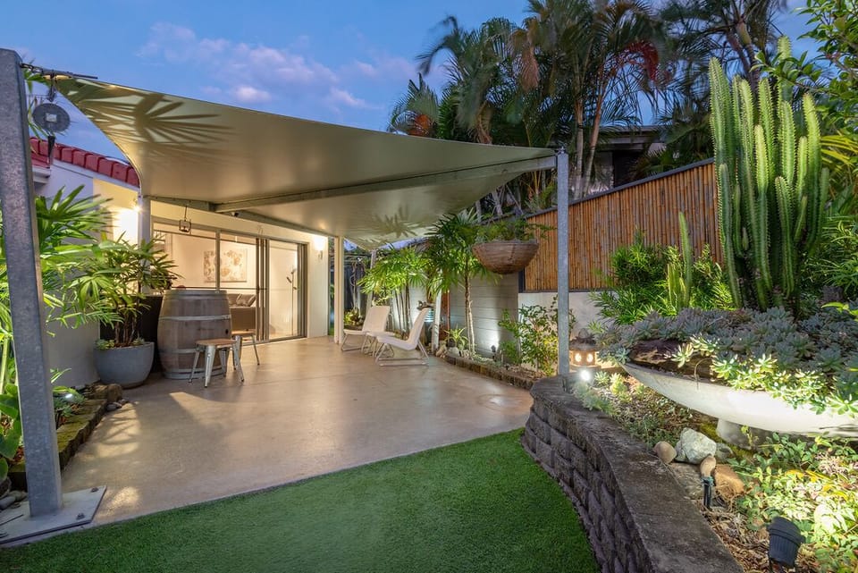 Your stair-free entrance opens to a serene private courtyard 