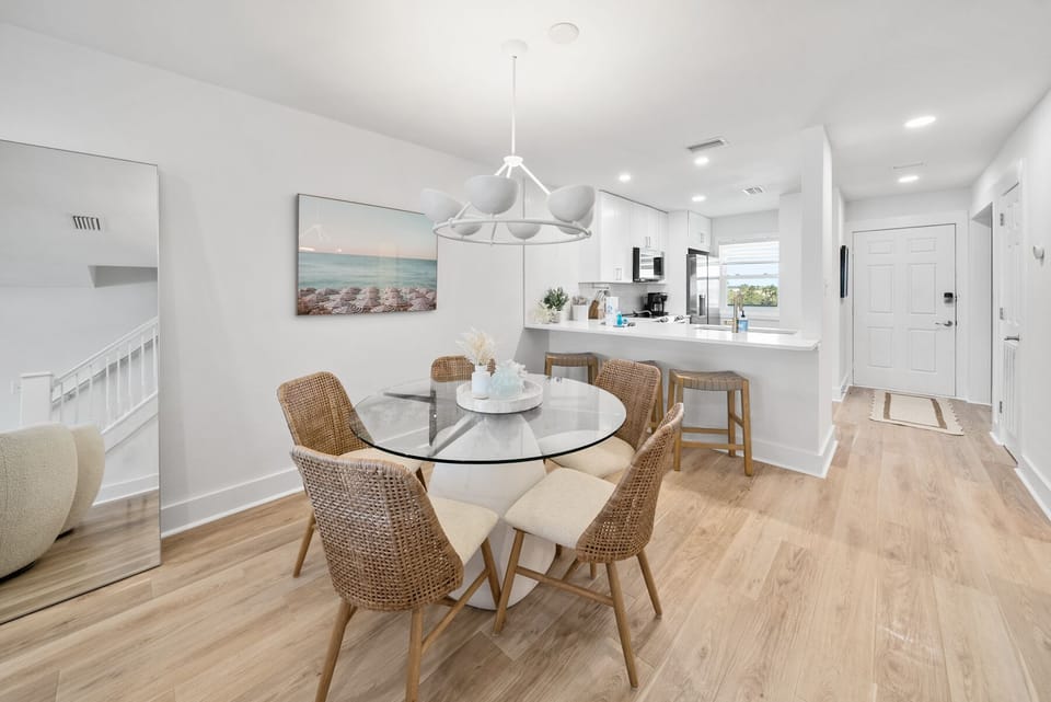 Your open dining area flows seamlessly into a modern kitchen, creating the perfect space for memorable meals and conversations.