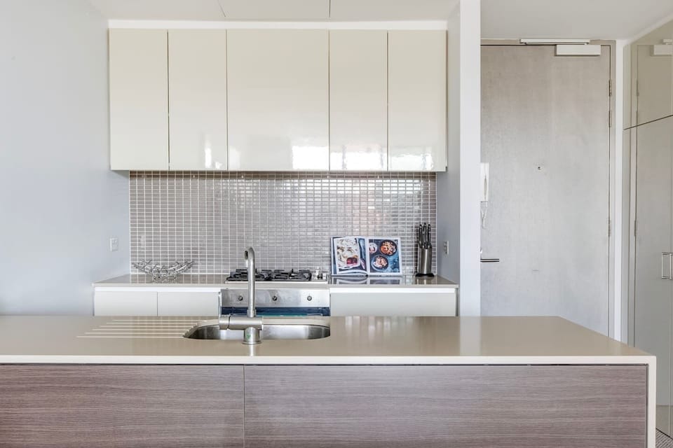 The kitchen comes well equipped for your holiday catering with sleek appliances and cooking utensils.
