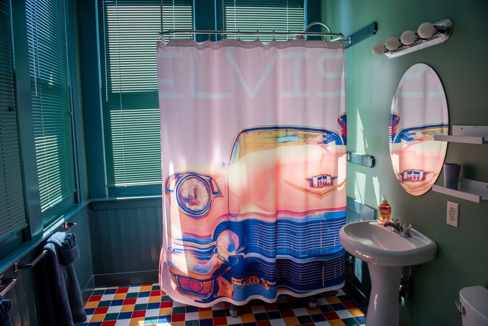 Full bathroom with clawfoot shower/tub combination