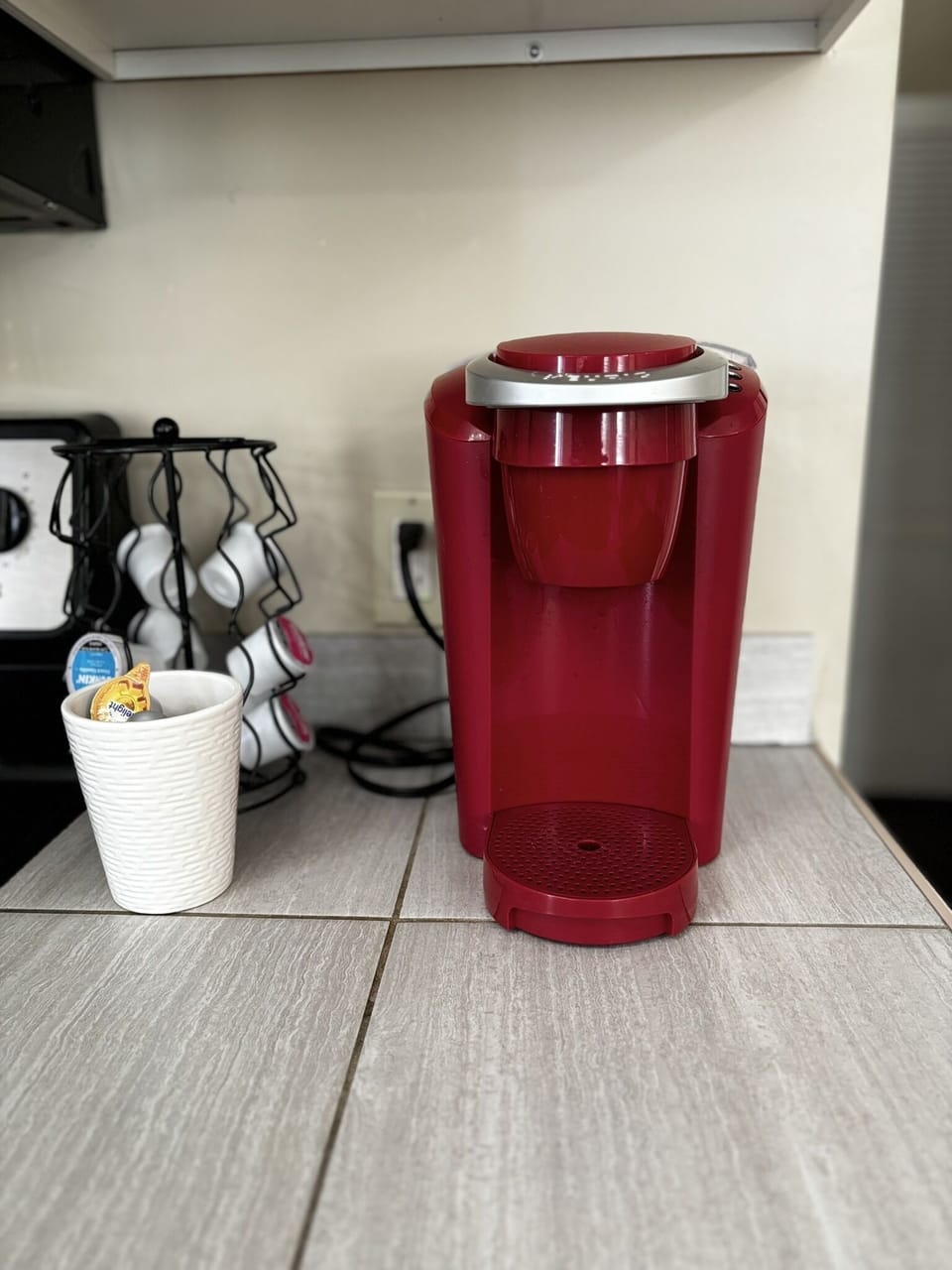 Start your morning right with a single-serve coffee maker and a variety of pods provided for your convenience.