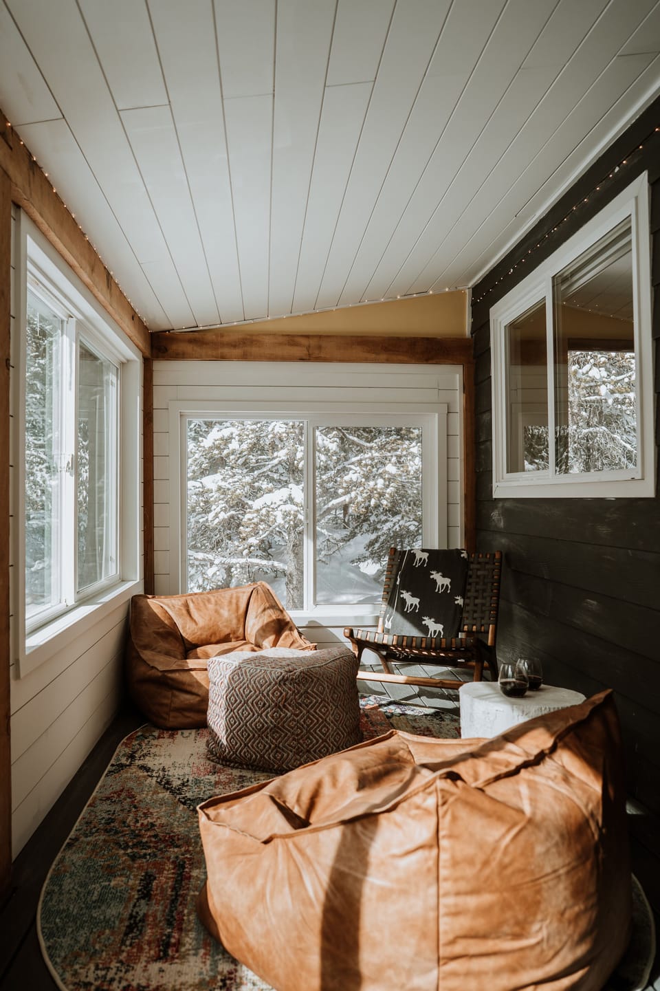 Relax on the 4-season porch, upstairs off the bedroom area. Take in the views!