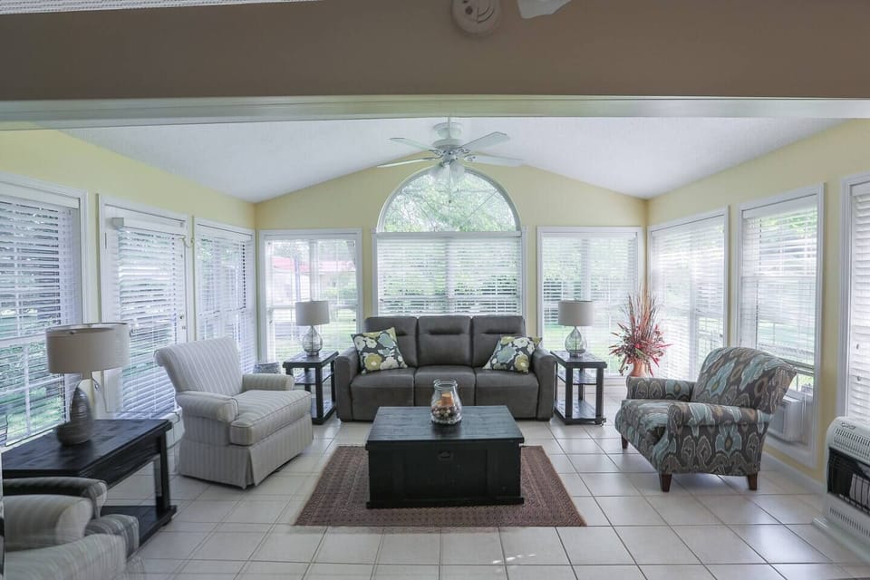 Sunroom serves as second living room.