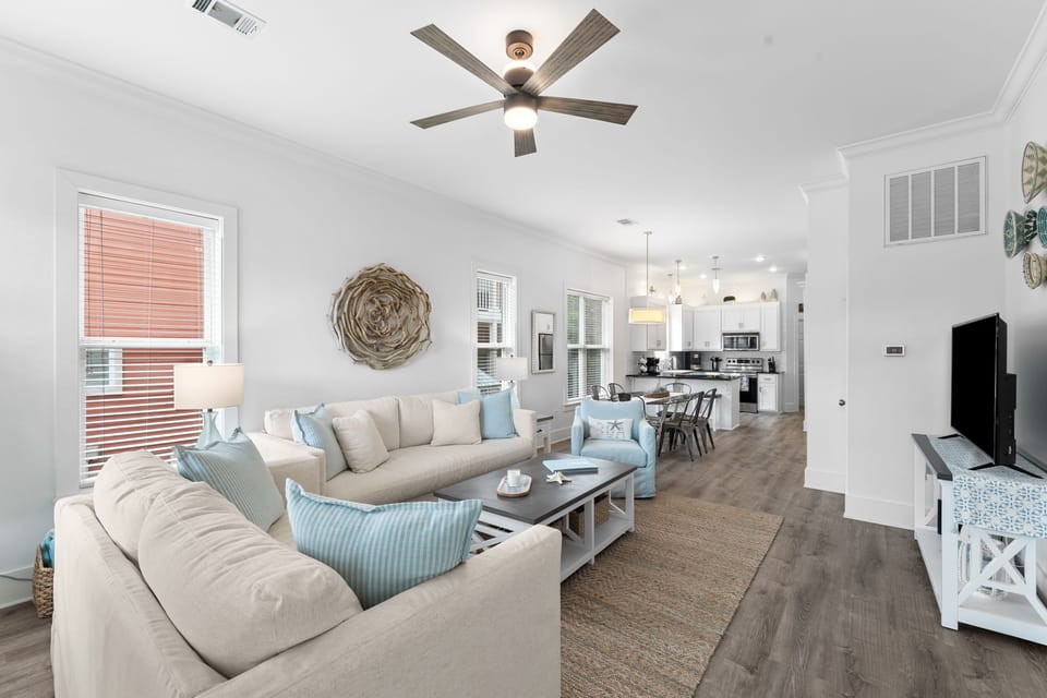 Sunnyside has an open concept living room, dining area and kitchen.