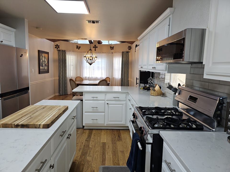 Gas stove - Image does not do this room justice - It's a nice place to cook. 