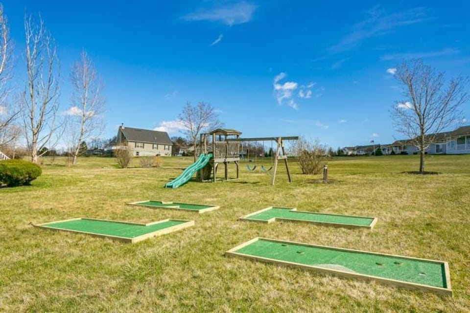 Kid's Swing set and 4-hole putt putt course is fun for everyone! 