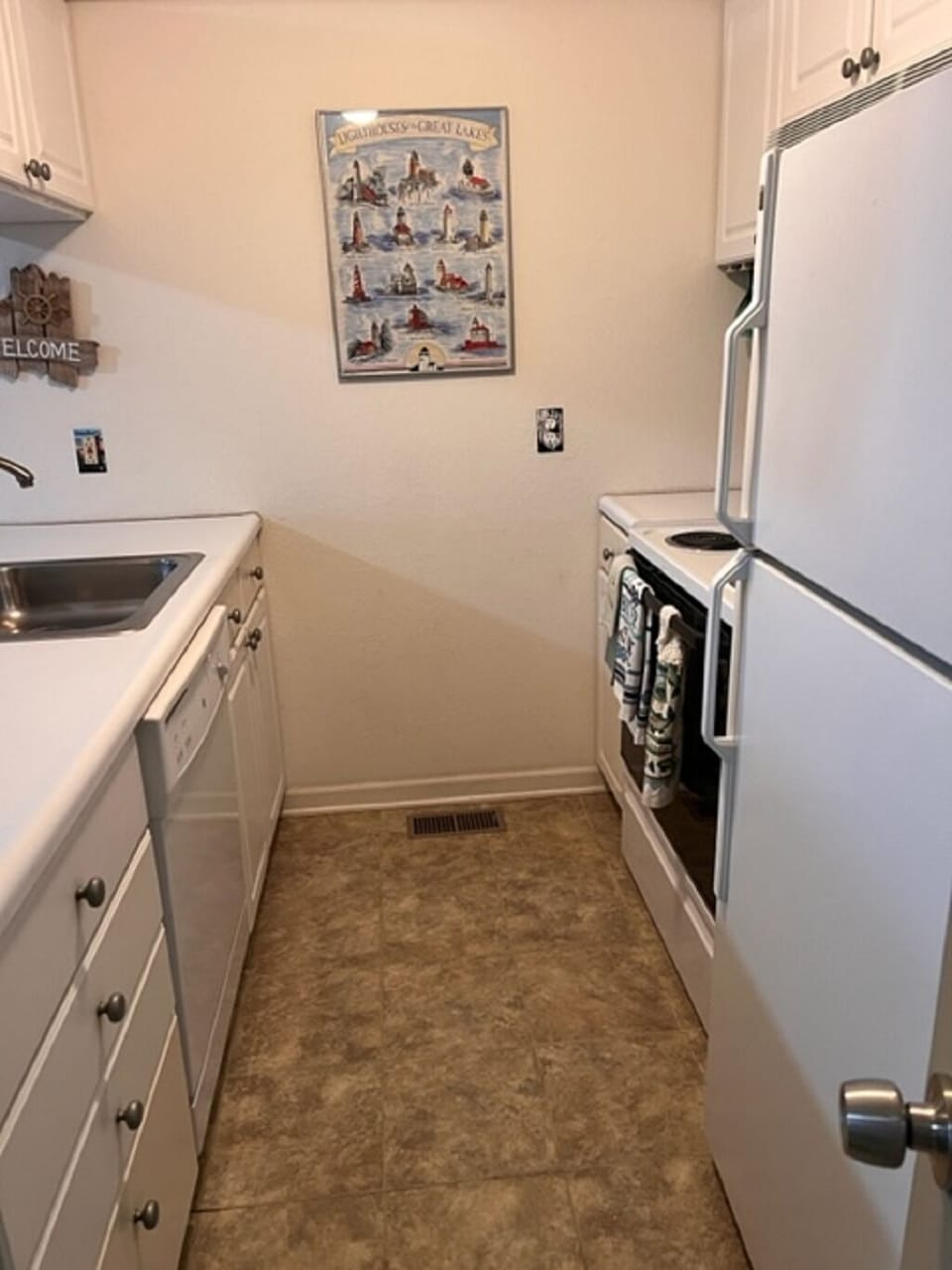 Kitchen includes dishwasher, stove/oven, fridge, and microwave