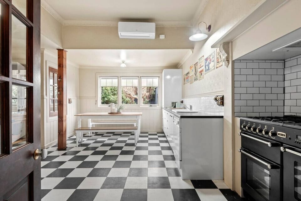 Kitchen & casual meals area with gas cooking & dishwasher