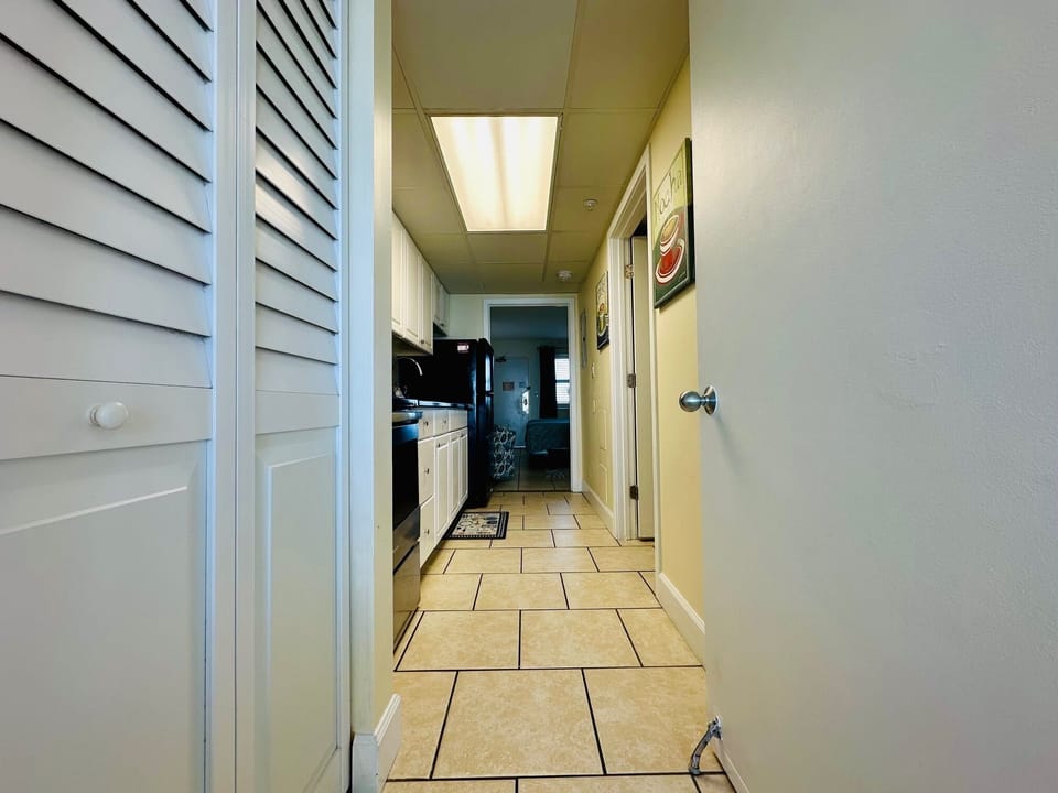 Back to the Kitchen Galley from the Bathroom to the Living Room Area