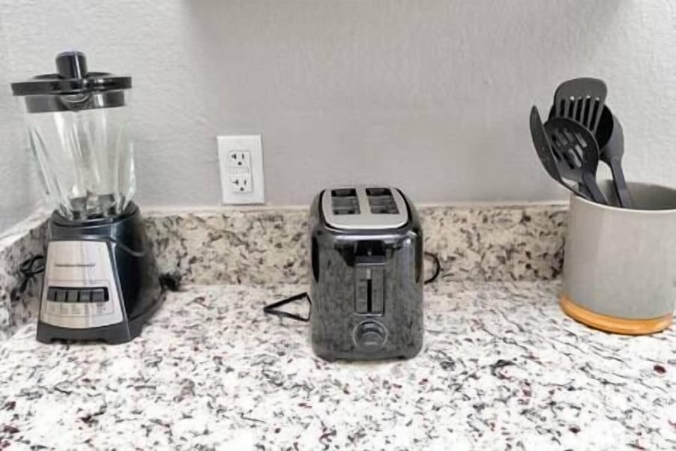 blender, bread toaster and kitchen utensils